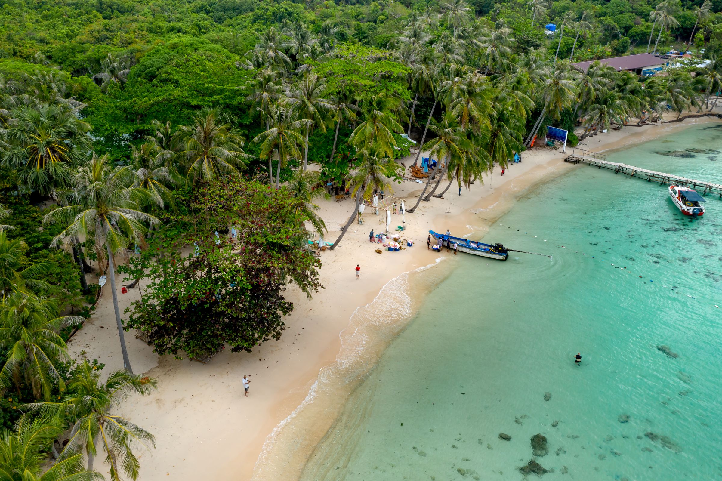 Aerial view of a tropical island and turquoise Caribbean water
